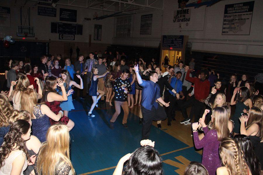 Students dance at Winter Formal. The event was organized by the Student Council, and held in the Gym on December 3.