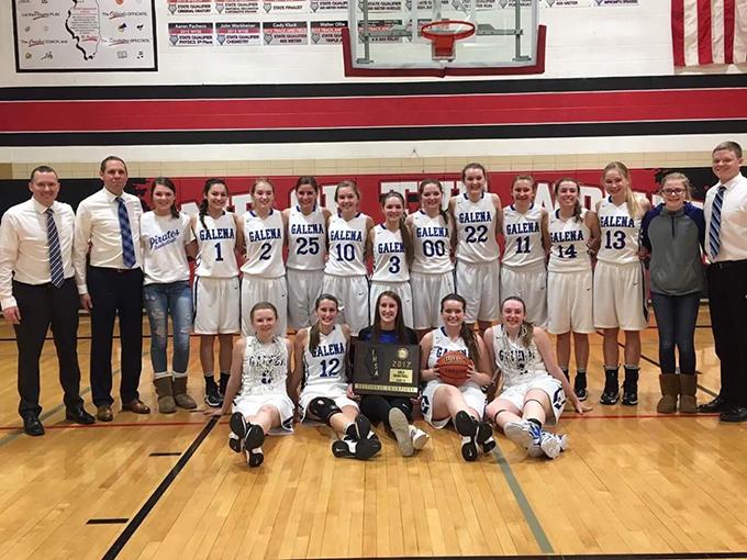The girls pose with the Sectional Championship plaque after claiming it for the second straight year. 