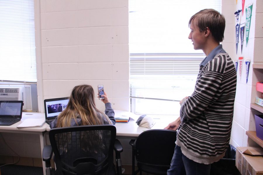 Snap out of it. Snapchat causes a distraction for seniors Robert Schuh and Addison Soat during their online class. Schuh was going on a rant about online classes, so Soat decided to put his rant on her story. “Online classes offer many evils that can cause gaps in learning,” said Schuh.