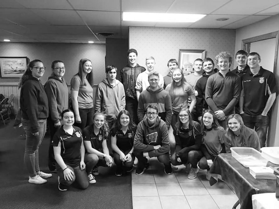 Galena FFA alumni held their first annual fish fry, followed by the alumni auction. Pictured, Samantha Deinineger, Aly Anderson, Sadie Sedbrook, Sam Niedholdt, Jarrett Bastan, Nate Heuer, Dylan Shemehorn, Austin Meyer, Hunter Bastan, Kade Timmerman, Chance Wills, Connor Einsweiler, Mackenzie Furlong, Maggie Handfelt, Samantha Stoffregen, Chris Simmon, Kenzie Casper, Addison Soat, Sawyer Quick. FFA had a great success at the FFA fundraiser as they sold just under 400 tickets for the dinner that following the auction. Maggie Handfelt ‘21 said, “ I was happily surprised at how many people showed up to the fish fry. It really meant alot that so many people did show up and rally together for out chapter.”  
