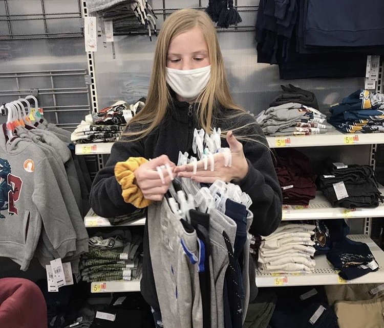 Shopping Fun! Ally Basten ‘24 participates in buying warm clothes for children in need in our school district. “I truly enjoyed being able to help in this service project because it was a fun way to be able to help those who are less fortunate, while still being safe and having fun!” she said.