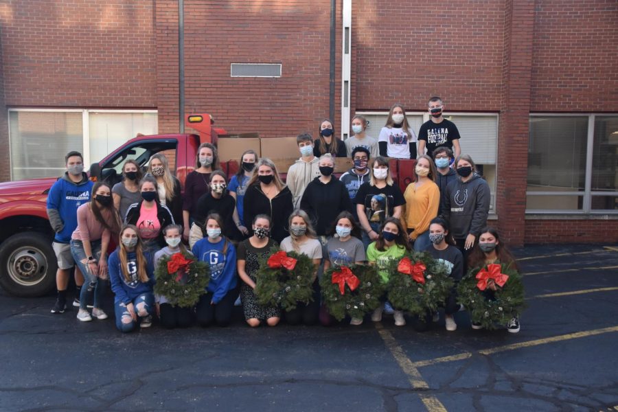 Teamwork+makes+the+dreamwork.+The+GHS+Key+Club+poses+together+after+wrapping+the+one+hundred+and+ten+wreaths+to+donate+to+CIty+Hall+for+decorating+Main+Street.+Within+30+minutes+of+working+together%2C+they+were+able+to+get+all+of+the+wreaths+shipped+off.+%E2%80%9CIt+was+a+unique+way+to+have+people+come+together+during+these+odd+times.%E2%80%9D+%2Csaid+Sydney+Benson+%E2%80%9821.+%E2%80%9CIt+was+a+great+way+to+give+back+to+our+community+and+I+had+a+lot+of+fun.%E2%80%9D