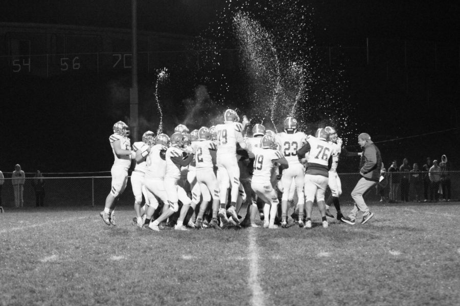 The GHS football team celebrates after winning their game against East Dubuqe on Friday, Oct. 22. This win qualified the team for the playoffs for the first time since 2015. The team traveled to Forreston on Oct. 29 to play in the first round of 1A competition. 
