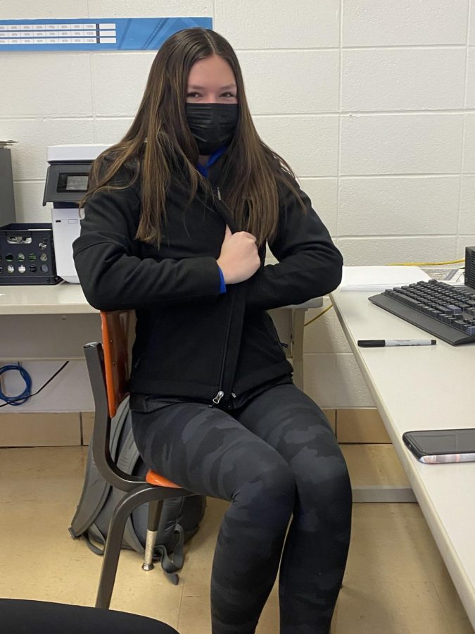 Maddy Glasgow ‘22 bundles up in the publications classroom during first hour. “I never know what to expect at Galena High School and always have to be prepared for anything” said Glasgow. 
