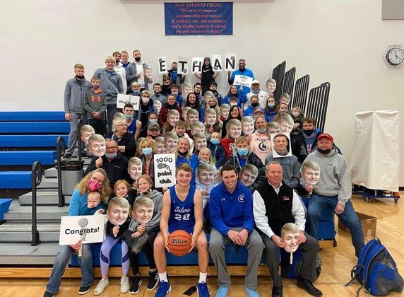 Galena fans celebrate 1000 points. Ethan Hefel is surrounded by his friends and family after a big game. At the Eastland Holiday Tournament Hefel drained a three-pointer, which helped him reach an astonishing goal of 1000 points. “Having all my family and friends travel to Eastland was a good feeling,” said Ethan. “It really showed that it meant just as much to them as it did to me.”  