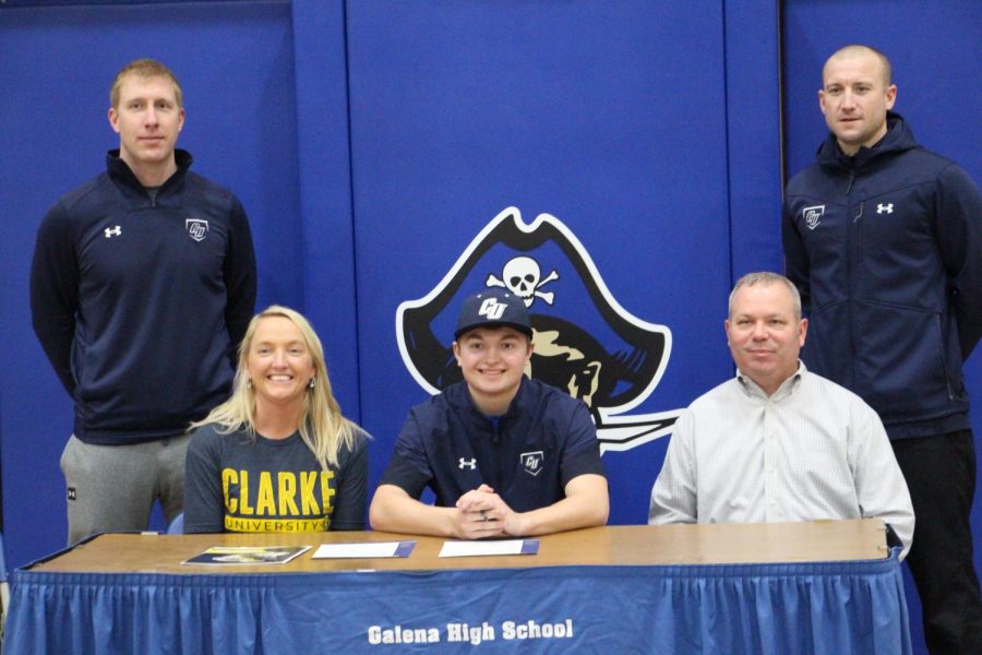 An exciting day for Hefel. Ethan Hefel is surrounded by his parents and new baseball coaches, as he signs to Clarke University to continue his baseball and academic career. On January 27, Ethan Hefel’s friends and family joined him when he made his commitment. “Having the people that are closest to me there, shows the great support system I had during my high school career,” he said. “It gets me excited for the years to come!”