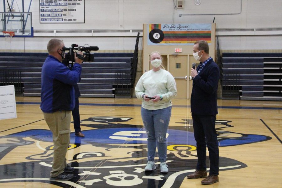 Abby Ehrler ‘24 recives the Hometown Hero awad from KWQC-TV6 in front of the entire school. “I am incredibly honored and grateful for the Hometown Hero award that I won last week,” she said. “Giving back is so important to me and it’s cool to see people recognize that.”