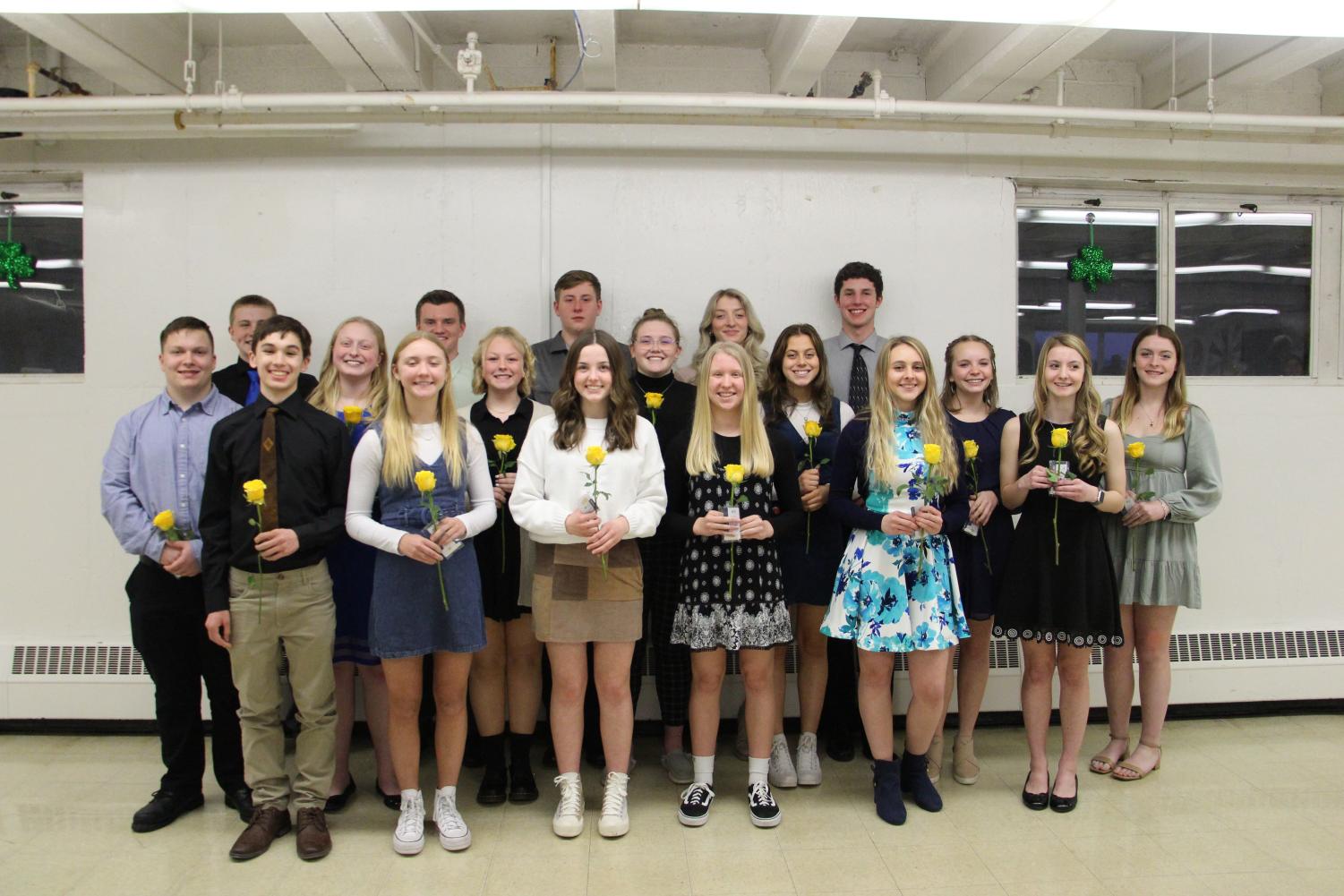 The newly inducted National Honor Society members hold their yellow roses and NHS pins after the induction ceremony. Students were inducted on March 14, in the GHS cafeteria. These high achieving students showed characteristics of leadership, service, good character, and academic success. “As a prior member, I am so excited to have so many new members get inducted and I am so proud of all of them,” said member Julia Townsend ‘23. 