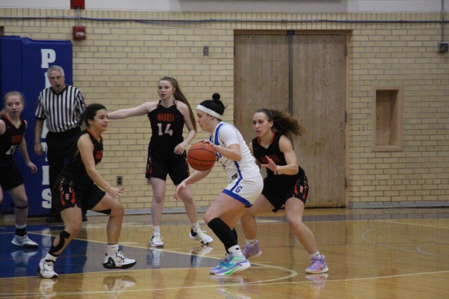 Taylor Burcham attacked the hoop during a home game against Warren on January 12, 2023. The Pirates won 57-26 during this game. “I can’t wait to see what the rest of the season holds for us,” said Taylor Burcham ‘24. 