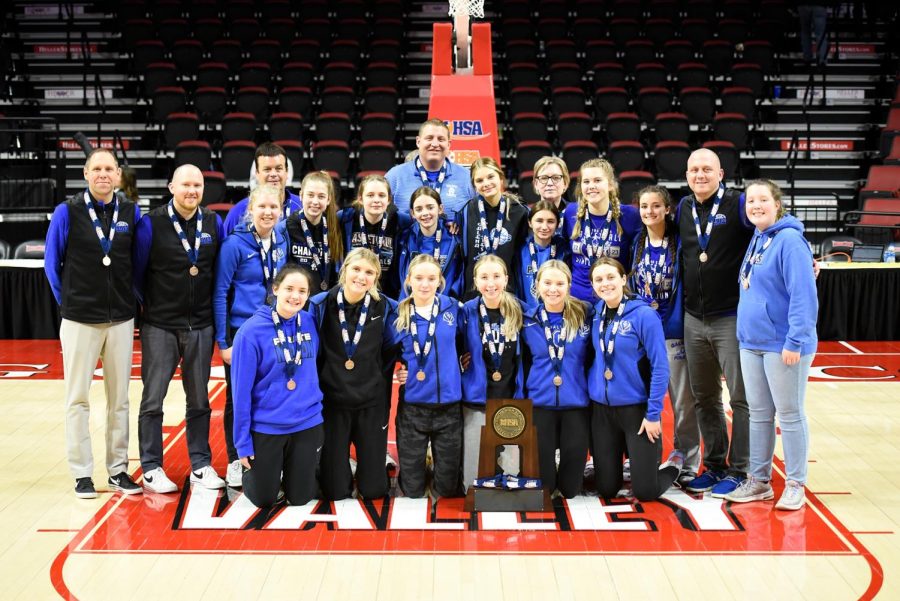 They%E2%80%99re+back+and+better+than+ever%21+Galena+High+School%E2%80%99s+girl%E2%80%99s+basketball+team+smile+with+their+third+place+trophy+and+medals+after+making+it+to+state+for+the+second+year+in+a+row.+After+another+long+season%2C+the+girls+finished+out+at+the+biggest+tournament+of+the+season%3A+the+state+tournament+at+Redbird+Arena.+After+losing+the+first+game+to+Okawville%2C+the+girls+went+on+to+beat+St.+Thomas+Moore+48-60.+Front+Row%3A+Taylor+Burcham+%E2%80%9824%2C+Paeton+Hyde+%E2%80%9823%2C+Gracie+Furlong+%E2%80%9825%2C+Addison+Hefel+%E2%80%9824%2C+Julia+Townsend+%E2%80%9823+and+Gwen+Hesselbacher+%E2%80%9823.+Back+Row%3A+Coach+John+Helle%2C+Coach+Jamie+Watson%2C+AD+Ed+Freed%2C+Emma+Furlong+%E2%80%9824%2C+Abigale+Merritt+%E2%80%9825%2C+Macy+Schulz+%E2%80%9824%2C+Naveah+Ottenhausen+%E2%80%9826%2C+Superintendent%2C+Tim+Vincent%2C+Mya+McCoy+%E2%80%9826%2C+Julie+Furlong%2C+Dani+Rae+Hulscher+%E2%80%9826%2C+Cameron+Einsweiler+%E2%80%9826%2C+Evelyn+Callahan%2C+Coach+Joe+Engle%2C+Team+Manager%2C+Grace+Connor+%E2%80%9825.
