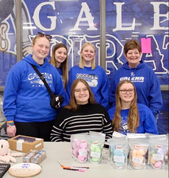 Galena High School FBLA members, Abby Ehrler 24, Emma Northrup 24, Emma Blaum 24, Julia Dominiak 25 and Madison Wild 24 pose with Barb Hocker, President of the Galena Chamber of Commerce, during the clubs successful craft and vendor fair.