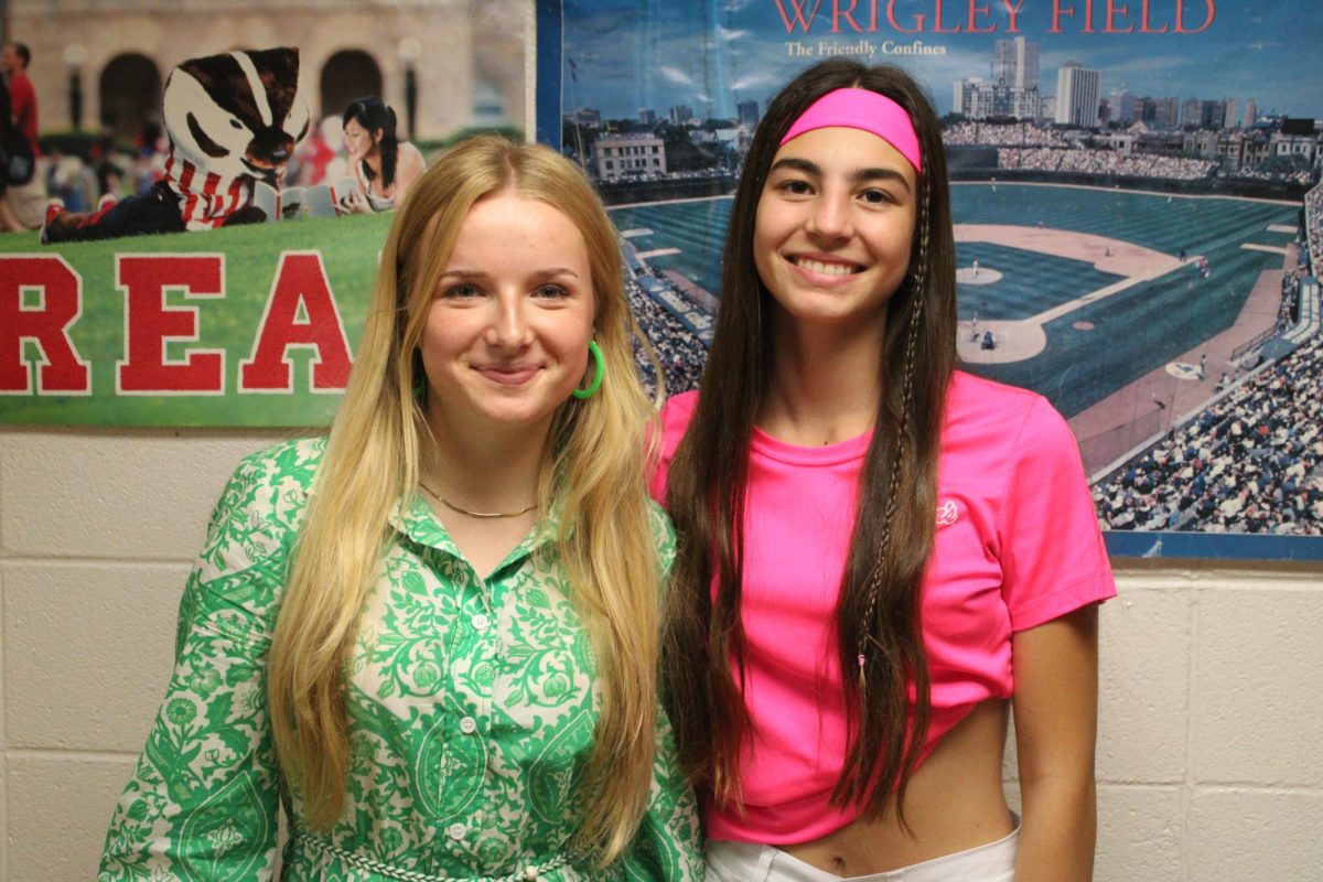 Martha Schubert, GHS ‘26, and Cata Mauro, GHS ‘25, smiling for Homecoming Neon Day