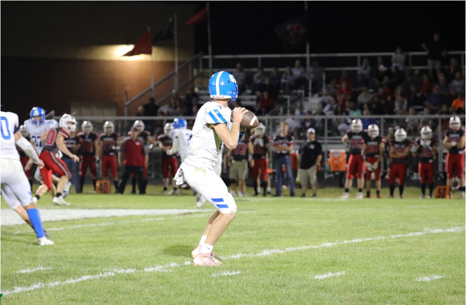 The throw that wins the Game! Roman Romer '26 throws the ball to Myles Schumacher '25 who runs 40 yards, scoring the winning touchdown during the Forreston game on September 13.
