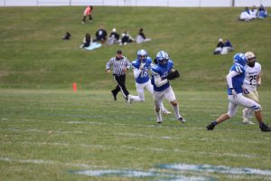 INTERCEPTED! Gus Nack ‘26 picks off the ball to help the Pirates win over Marquette. This was Gus’s second turnover of the game after he forced a fumble. “That play felt surreal because this was my first interception of the season and it was when my team needed it.” Nack said.  