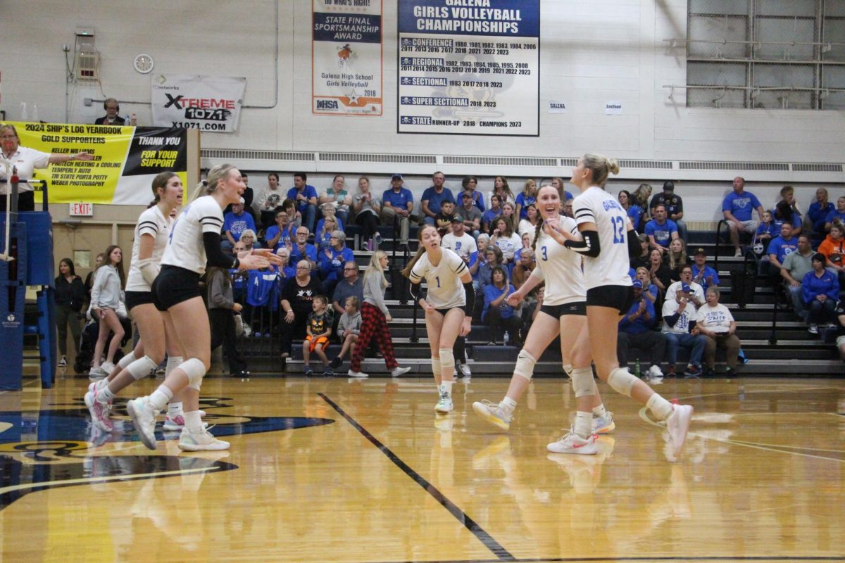 Set! Bump! Kill! The Galena Girl’s volleyball team cheer in victory as they receive a point during Regional Semi-finals on October 30. “I was not ready to be done yet and I played my heart out,” said Gracie Furlong ‘25. 