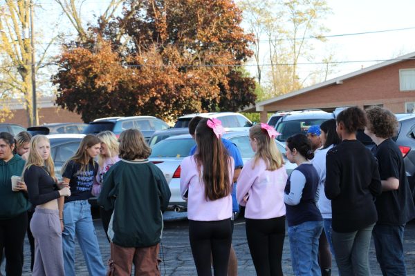 Run faster! GHS choir students and sports director Mr. Freed in the upper parking lot, taking attendance. Students and staff practiced the active intruder drill on Friday, October 25, 2024. Daisha Balayti 26’ said, “I feel like this drill was very helpful for me and others to know what to do in case of an emergency” 