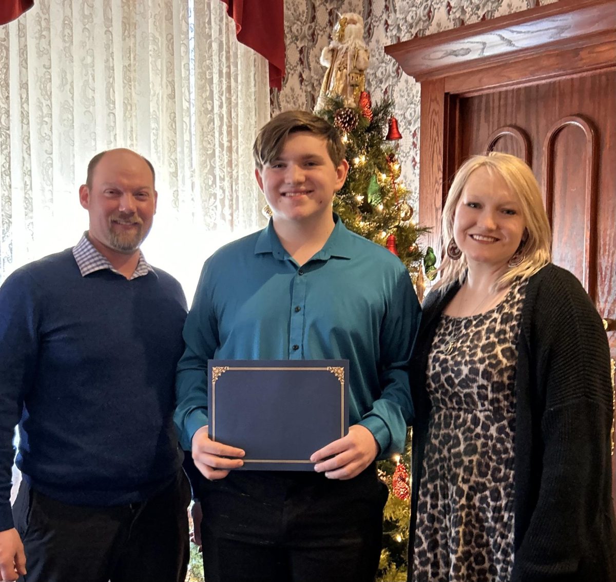 Feeling accomplished, Martin '27 proudly poses with his family at the rotary lunch at the Desoto House. "When I got the student of the quarter, I was very proud of myself. It meant a lot that I got a reward like this at my school and made me think I was working hard and it was paying off." Martin shares.  Martin and other student's in the Jo Davis County Area were also honored with this award.