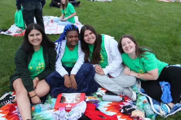  Senior Sunrise. Addison Zambrano 25’ Vanessa Fair 25’ Claudia Liberg 25’ Grace Connor 25’ at the Galena Football Field for the senior sunrise. Early in the morning gather to watch the beauty happen on the first last day of school. “I brought donuts for me and my friends to eat as we talked and watched the sunrise,” Grace Conner said.