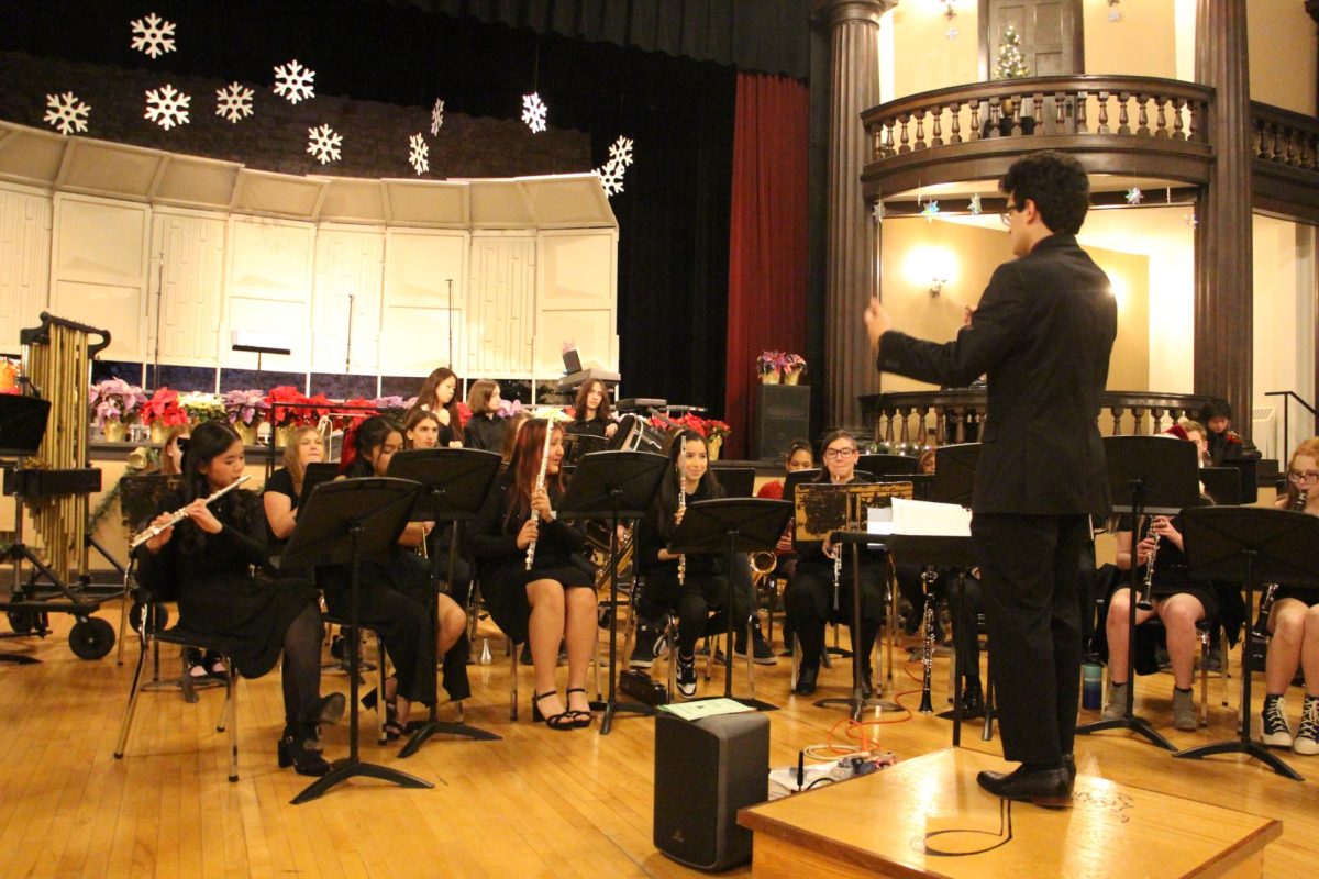 The Galena High School band, conducted by Mr. Suau, during their 2024 Winter Concert