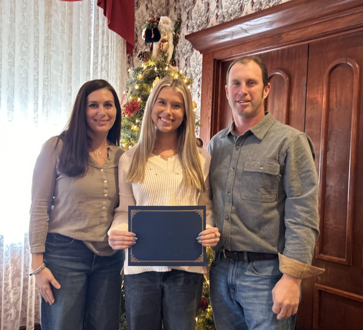 Ecstatic Ehrlers gather to take a photo celebrating Emma Ehrler '28 on earning the Rotary Student of the Quarter award. They were treated to a luncheon at the DeSoto House to reward her display of excellence. "I was delighted when I heard I got this award," Ehrler shared. "It showed that all my hard work this semester really paid off.  
